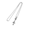 Pequeña CH Cross con un charm de bola de plata Pequeña CH Cross con un charm de bola de plata