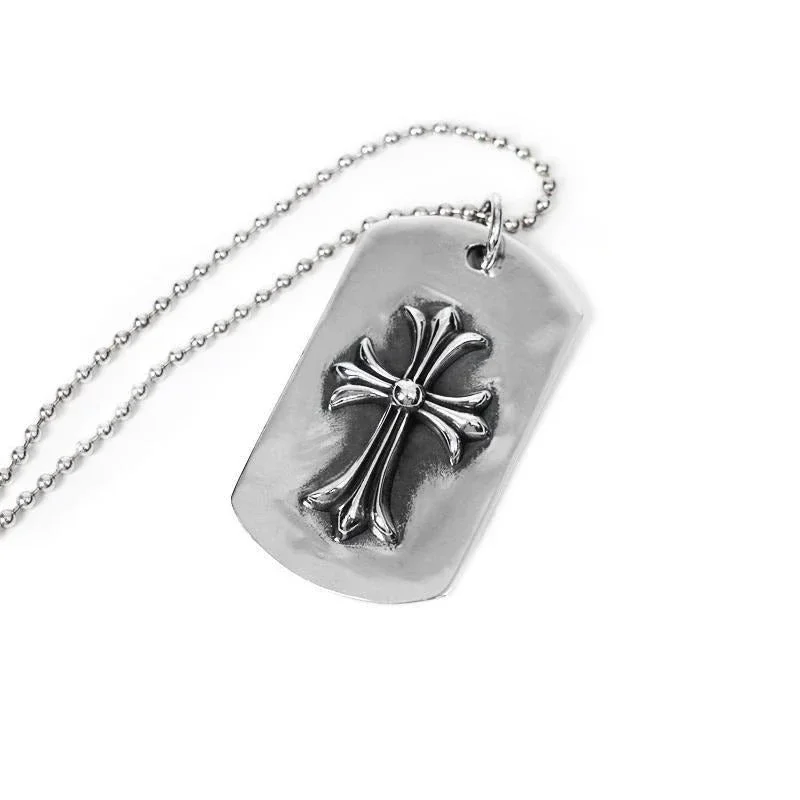 Pequeña Dog Tag con corte en forma de cruz